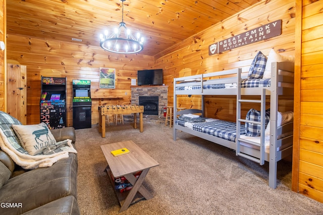 carpeted bedroom with a chandelier, wooden walls, and wooden ceiling