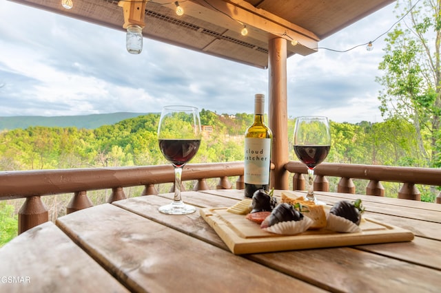 wooden deck featuring a wooded view