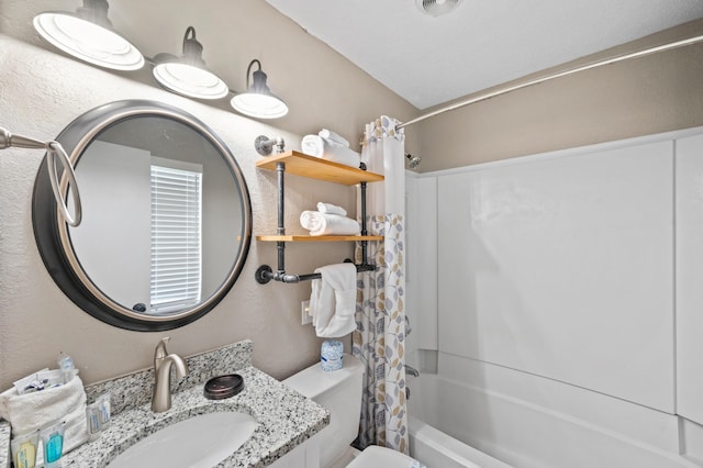 full bathroom featuring vanity, toilet, and shower / bathtub combination with curtain