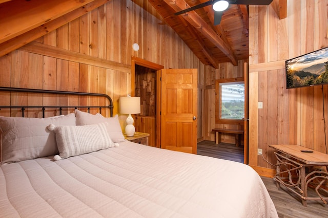 bedroom featuring ceiling fan, wooden walls, wooden ceiling, beamed ceiling, and hardwood / wood-style floors