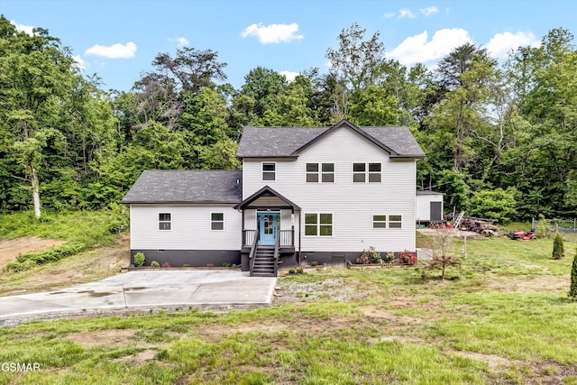 2438 Daniels Dr, Morristown, TN 37813 - rear view of house featuring a shingled roof and a lawn