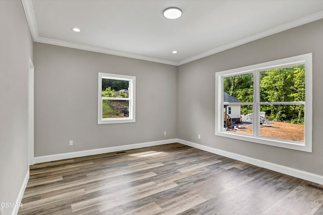 2438 Daniels Dr, Morristown, TN 37813 - unfurnished room with ornamental molding, baseboards, wood finished floors, and recessed lighting
