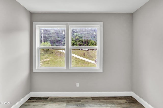 2438 Daniels Dr, Morristown, TN 37813 - unfurnished room with healthy amount of natural light, baseboards, and wood finished floors