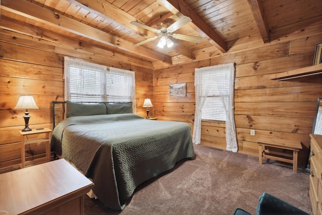 carpeted bedroom featuring beamed ceiling, wooden ceiling, and wood walls