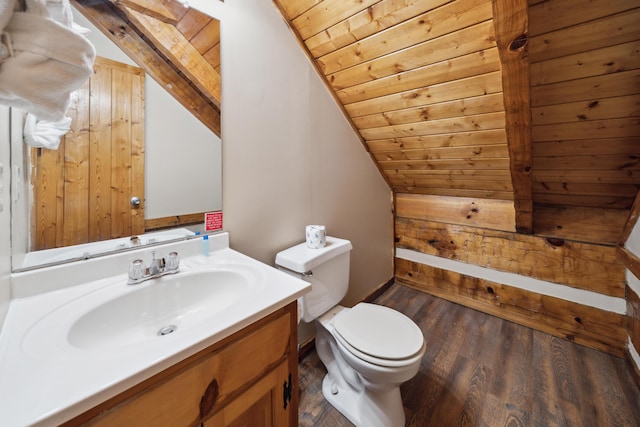 bathroom with vanity, wooden ceiling, vaulted ceiling, and wood finished floors