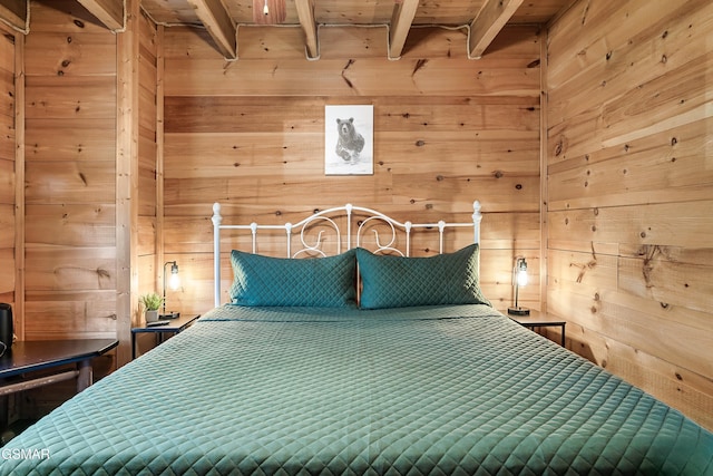 unfurnished bedroom with wood ceiling, wooden walls, and beam ceiling