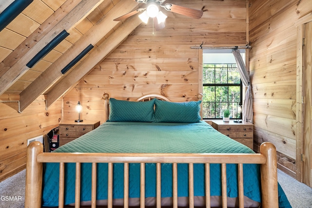 unfurnished bedroom featuring lofted ceiling with beams, carpet, and wooden ceiling