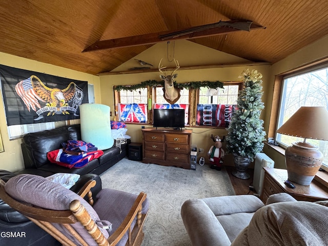 living room with carpet floors, lofted ceiling with beams, wooden ceiling, and radiator