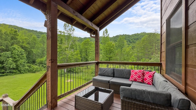 3955 Millers Ridge Way, Sevierville, TN 37862 - wooden terrace with a wooded view, an outdoor living space, and a lawn