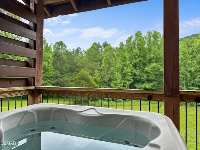 3955 Millers Ridge Way, Sevierville, TN 37862 - deck with a hot tub and a lawn