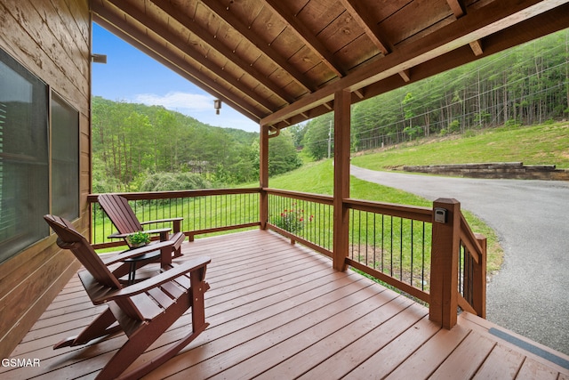 3955 Millers Ridge Way, Sevierville, TN 37862 - wooden terrace with a lawn and a wooded view