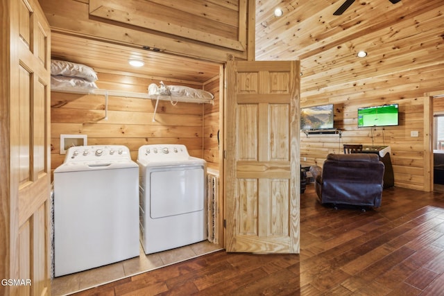 washroom with wood ceiling, independent washer and dryer, and hardwood / wood-style flooring