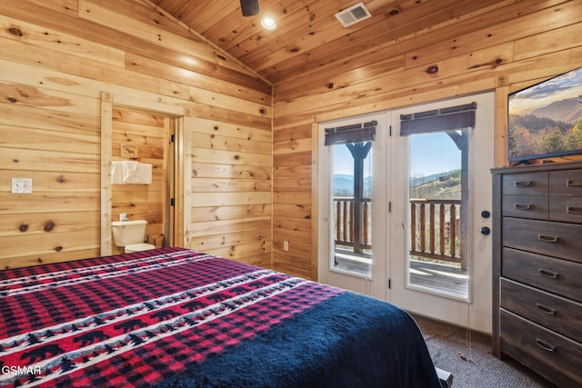 carpeted bedroom featuring wooden walls, visible vents, vaulted ceiling, wooden ceiling, and access to outside