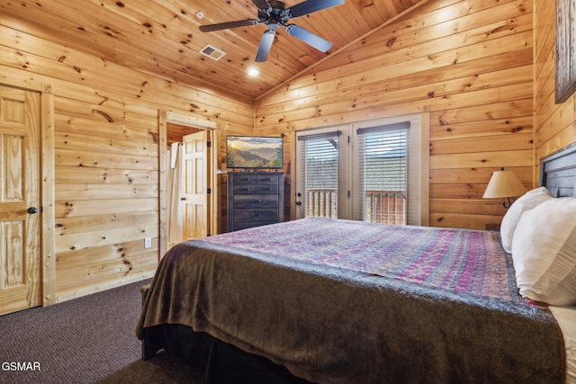 bedroom with wooden walls, carpet flooring, lofted ceiling, and access to outside