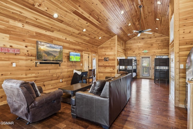 living area with high vaulted ceiling, a ceiling fan, hardwood / wood-style floors, wooden ceiling, and wood walls