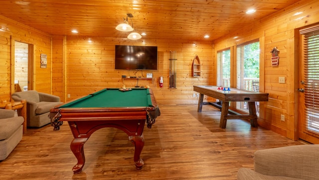 game room featuring wooden ceiling, wooden walls, wood-type flooring, and billiards