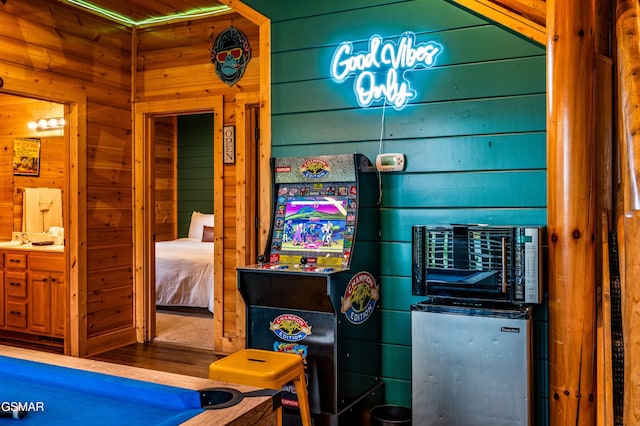 game room featuring wooden walls