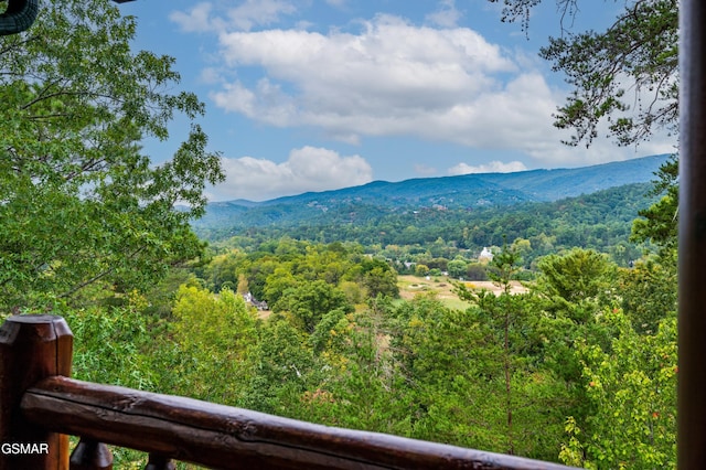 property view of mountains featuring a wooded view