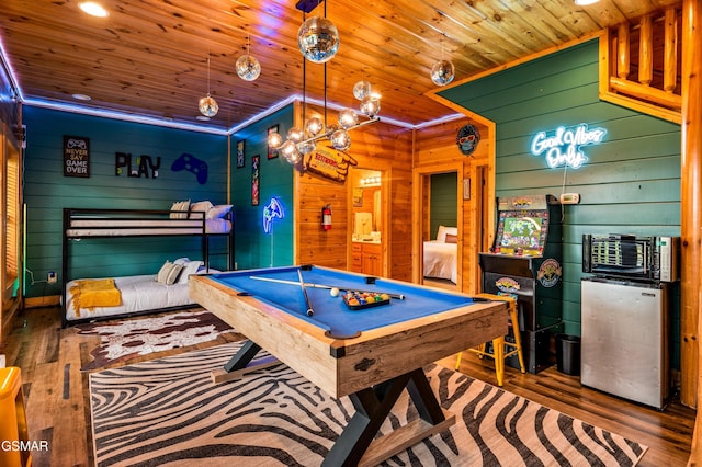 rec room featuring wood finished floors, wooden ceiling, and pool table