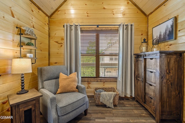 living area with wood ceiling, wooden walls, dark hardwood / wood-style flooring, and vaulted ceiling