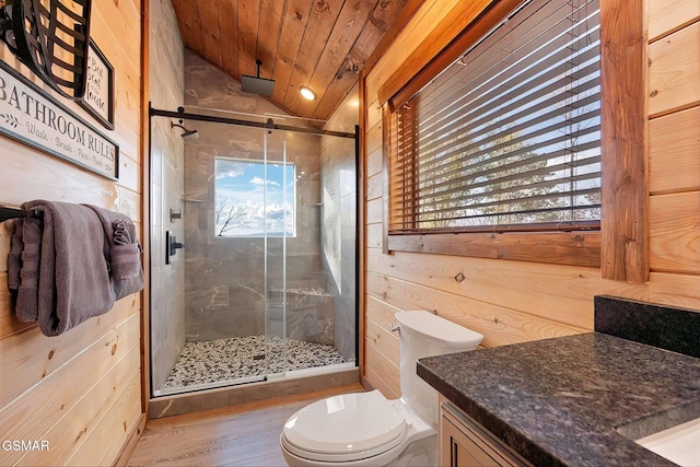 2229 Legend Dr, Sevierville, TN 37876 - bathroom with vanity, wooden ceiling, vaulted ceiling, a stall shower, and wood finished floors