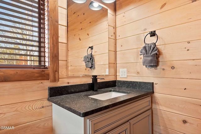 2229 Legend Dr, Sevierville, TN 37876 - bathroom featuring vanity and wooden walls