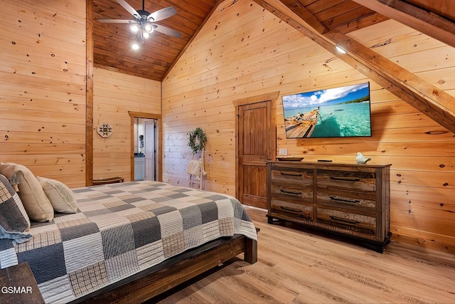 2229 Legend Dr, Sevierville, TN 37876 - bedroom with wooden ceiling, wood walls, light wood-type flooring, and high vaulted ceiling