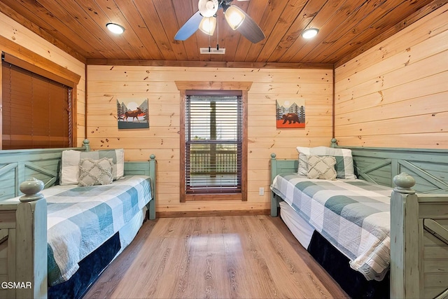 2229 Legend Dr, Sevierville, TN 37876 - bedroom with wooden ceiling, wood finished floors, wooden walls, and recessed lighting