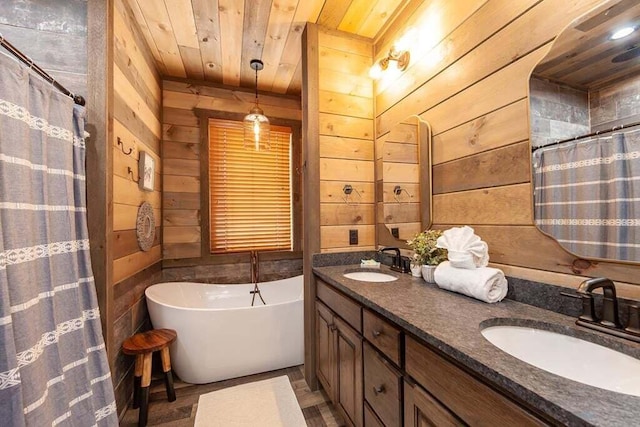 bathroom with wood walls, vanity, wood ceiling, and shower with separate bathtub