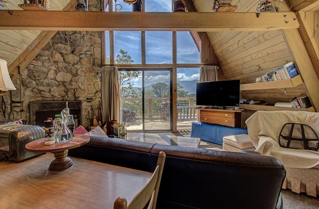 living room featuring a stone fireplace, beamed ceiling, wood ceiling, and high vaulted ceiling