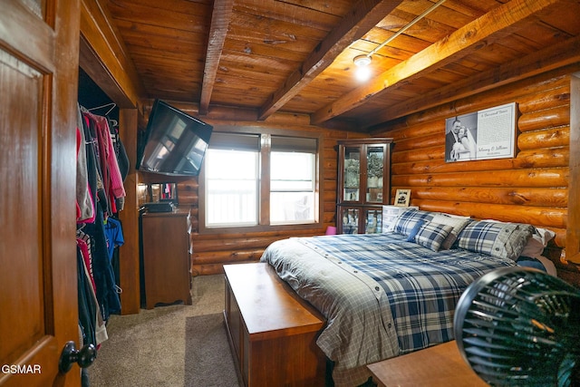 bedroom with beam ceiling, wood ceiling, carpet floors, and log walls