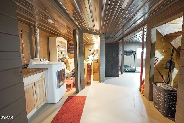 laundry room featuring cabinet space