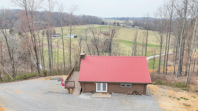 birds eye view of property featuring a rural view