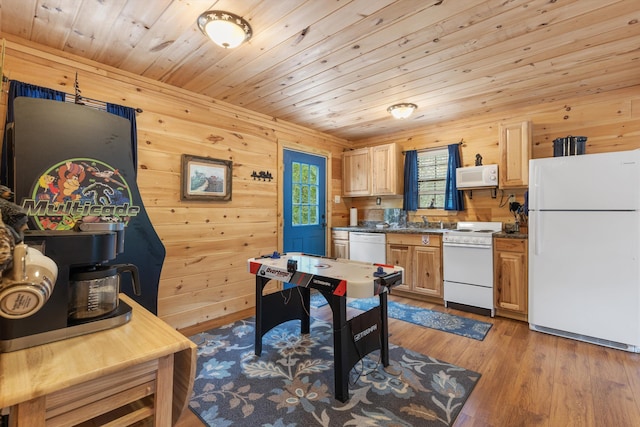 kitchen featuring light brown cabinets, wood walls, white appliances, light hardwood / wood-style floors, and wood ceiling