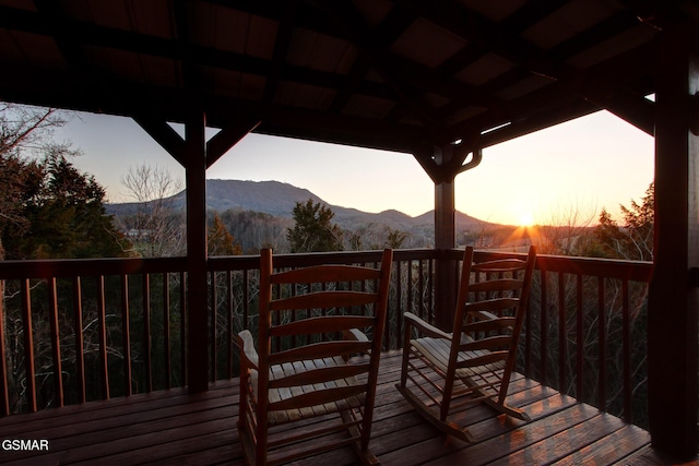 wooden terrace featuring a mountain view