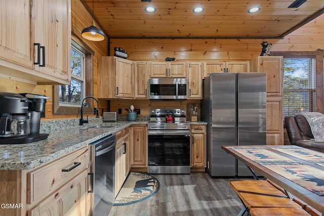 kitchen featuring wooden ceiling, stainless steel appliances, a sink, dark wood-style floors, and light brown cabinetry