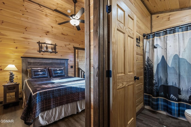 bedroom featuring wood walls, wood ceiling, and wood finished floors