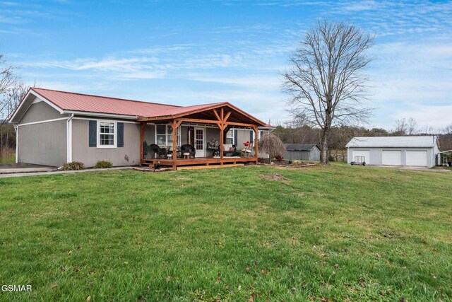 ranch-style home with a front yard, a shed, and a garage