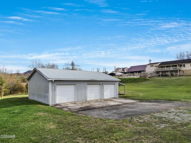 garage with a lawn