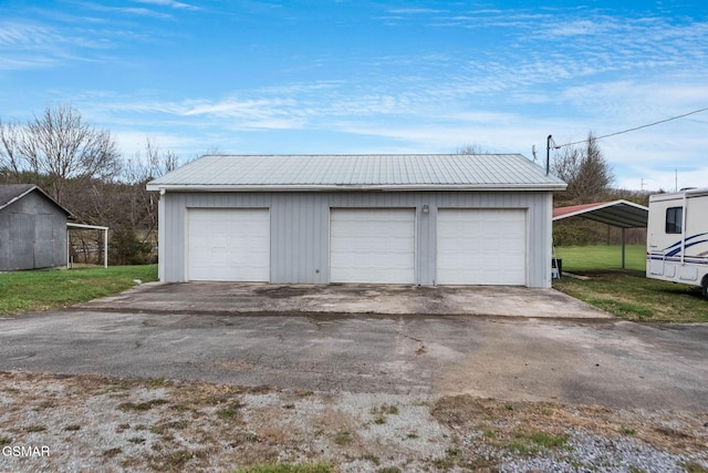 garage with a carport