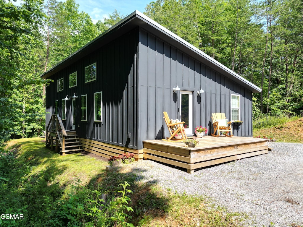 3180 Mcgill Rd, Sevierville, TN 37862 - back of property featuring board and batten siding and a deck