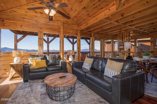 2412 Breezey Ridge Dr, Sevierville, TN 37876 - living area with a mountain view, hardwood / wood-style floors, a ceiling fan, lofted ceiling, and wood ceiling
