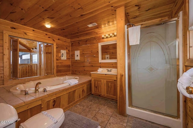 2412 Breezey Ridge Dr, Sevierville, TN 37876 - full bathroom with a shower stall, wooden ceiling, tile patterned floors, a garden tub, and vanity