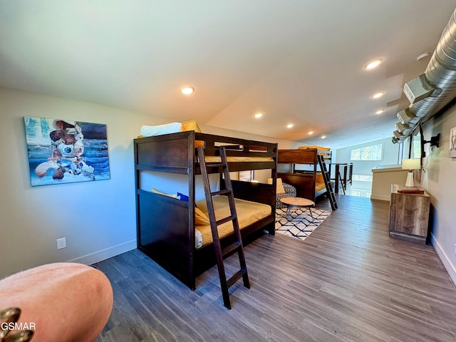 3343 Summit Trails Dr, Sevierville, TN 37862 - bedroom with wood finished floors, vaulted ceiling, baseboards, and recessed lighting