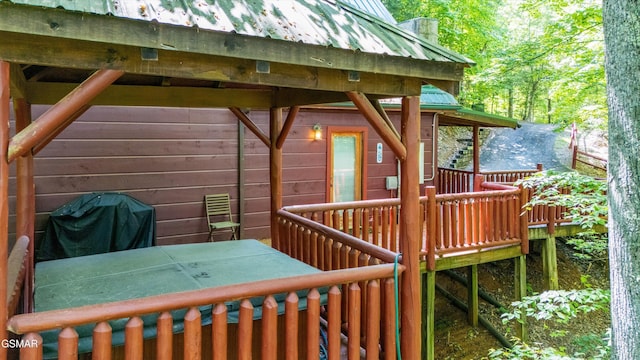 deck featuring a grill