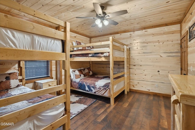 3316 Grace Way, Sevierville, TN 37876 - bedroom with wooden ceiling, dark wood-style flooring, wood walls, and baseboards