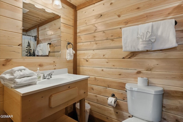3316 Grace Way, Sevierville, TN 37876 - full bathroom with wood walls, wood ceiling, vanity, toilet, and curtained shower
