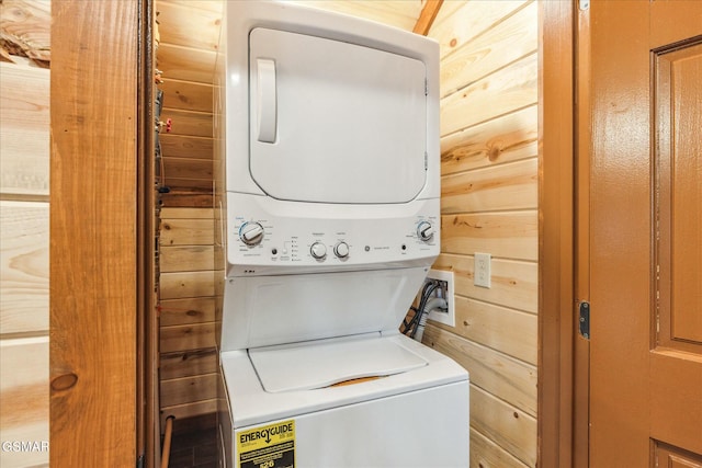 3316 Grace Way, Sevierville, TN 37876 - laundry area featuring stacked washer / drying machine and wooden walls