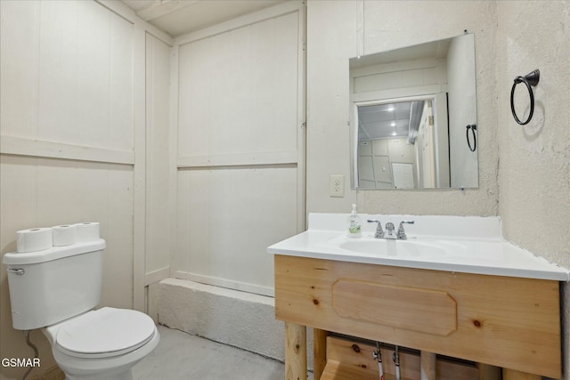 3316 Grace Way, Sevierville, TN 37876 - bathroom with toilet, vanity, and concrete floors