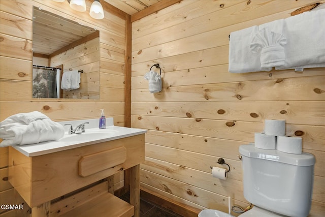3316 Grace Way, Sevierville, TN 37876 - bathroom with wood walls, wooden ceiling, toilet, vanity, and a shower with shower curtain
